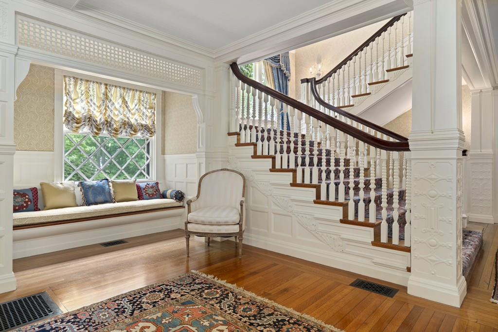 30 Warren Street Brookline, MA 02445 - Photo 12 of 27 a living room with wooden floor and a table
