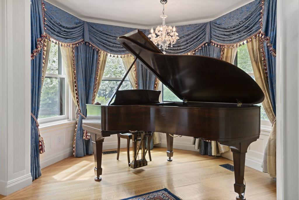 30 Warren Street Brookline, MA 02445 - Photo 14 of 27 a view of entryway dining room and hall with wooden floor