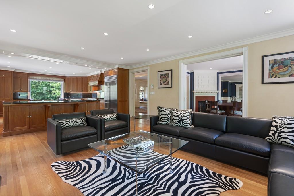 30 Warren Street Brookline, MA 02445 - Photo 19 of 27 a living room with furniture and a wooden floor