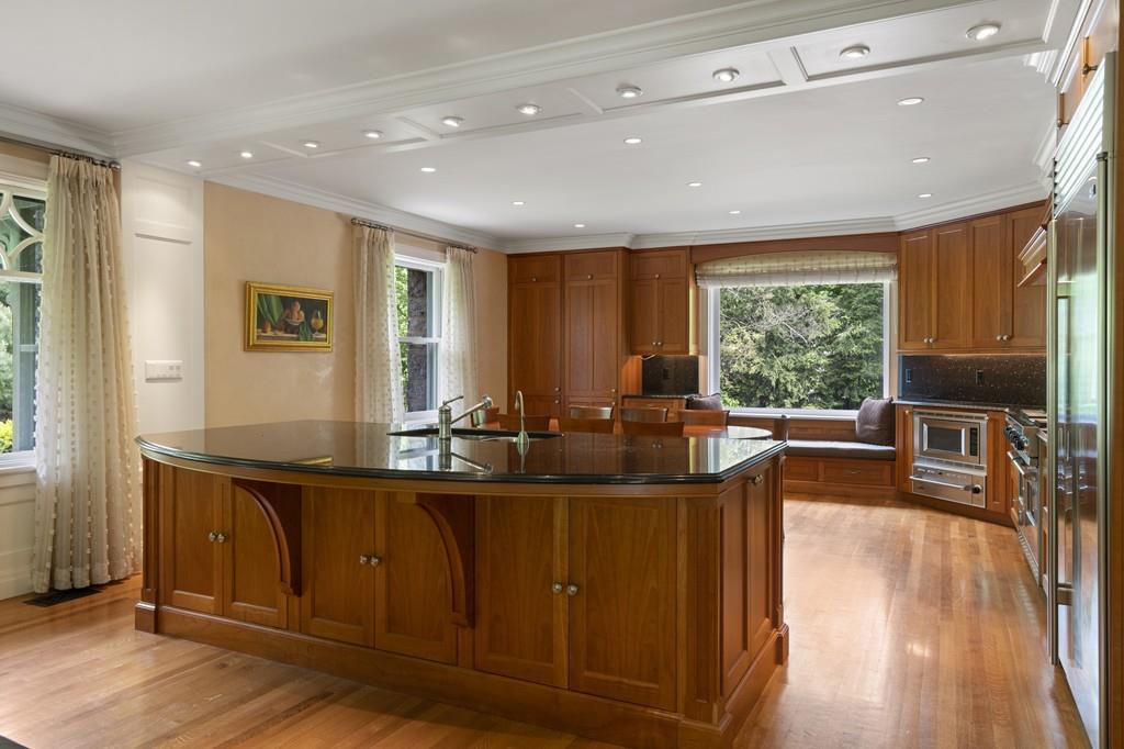 30 Warren Street Brookline, MA 02445 - Photo 20 of 27 a view of a kitchen and dining room