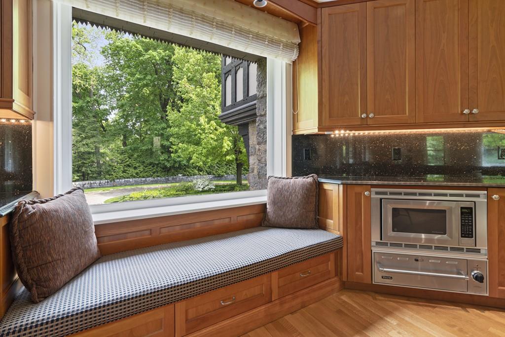 30 Warren Street Brookline, MA 02445 - Photo 22 of 27 a kitchen with a stove and a microwave