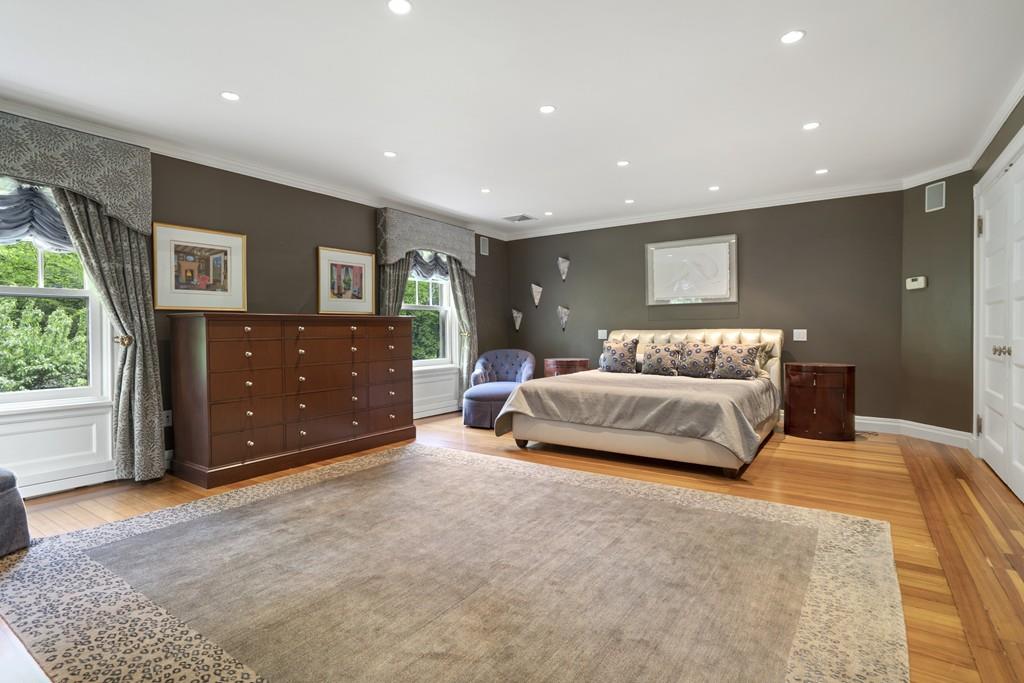 30 Warren Street Brookline, MA 02445 - Photo 24 of 27 a bedroom with a bed and window