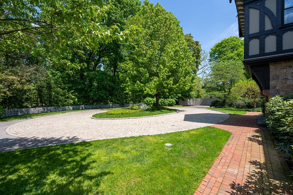 30 Warren Street Brookline, MA 02445 - Photo 3 of 27 a view of a swimming pool with a yard