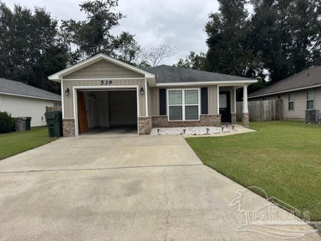 539 Evening Falls Drive Pensacola, FL 32534 - Photo 3 of 16 a front view of a house with yard and green space