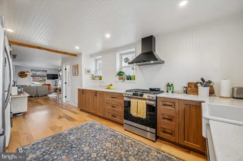a kitchen with a washer and dryer in it