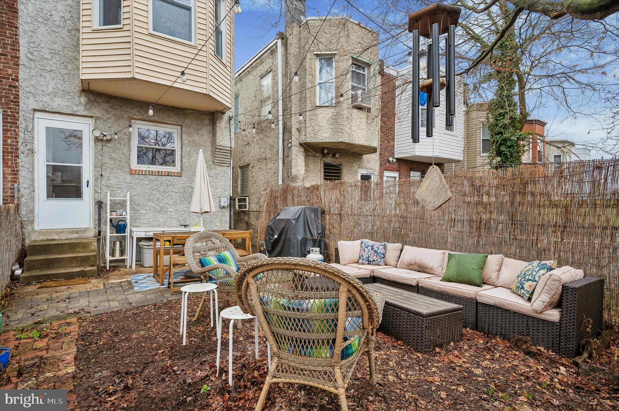 6626 Musgrave Street Philadelphia, PA 19119 - Photo 24 of 26 a view of a patio with couches table and chairs and potted plants