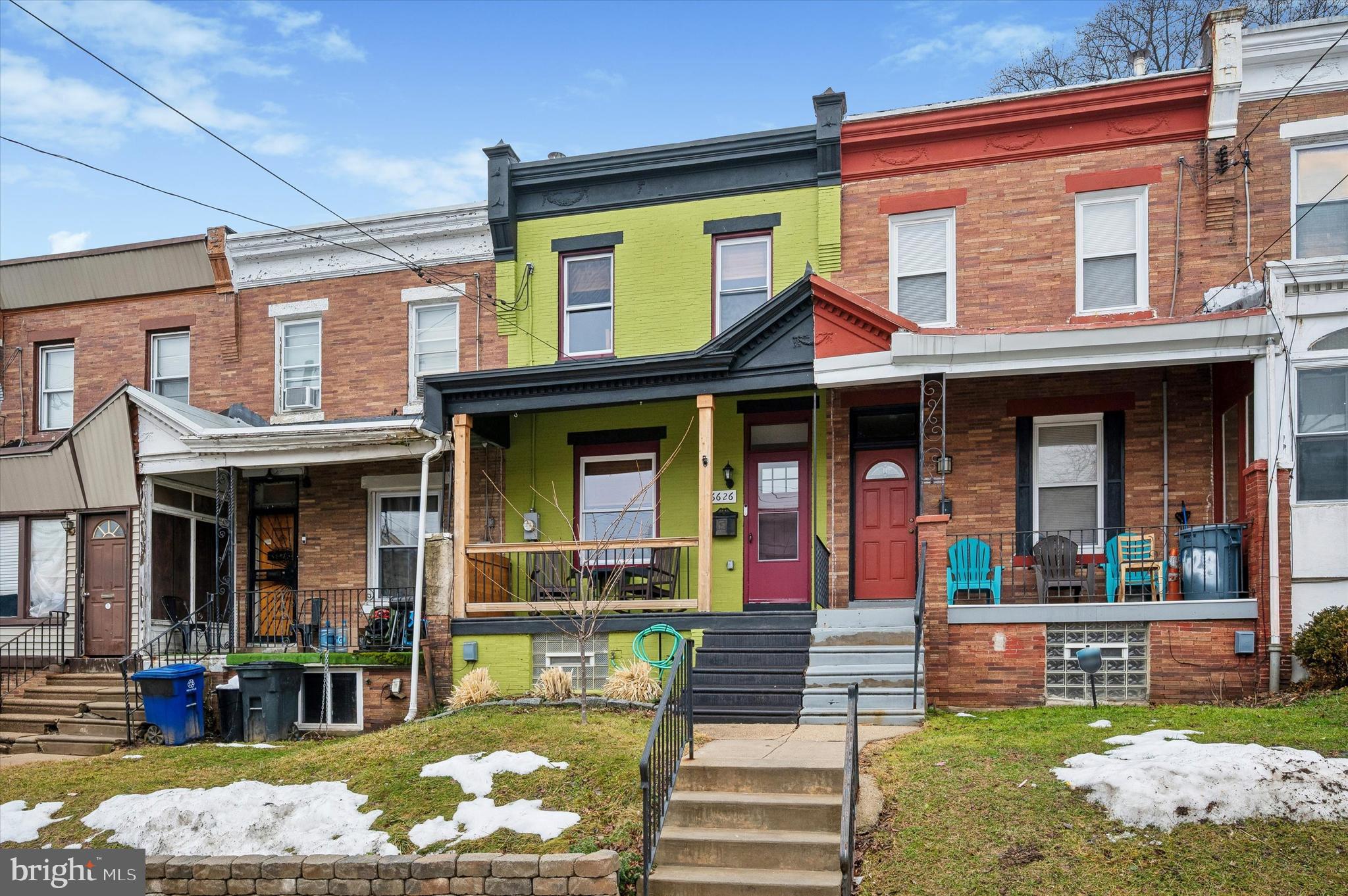 6626 Musgrave Street Philadelphia, PA 19119 - Photo 25 of 26 front view of a brick building with a yard