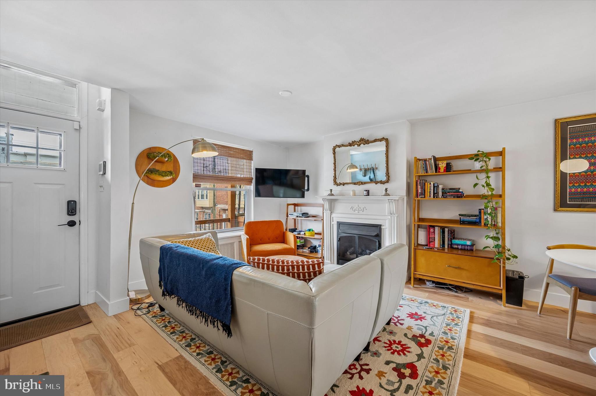 6626 Musgrave Street Philadelphia, PA 19119 - Photo 3 of 26 a living room with furniture and a flat screen tv