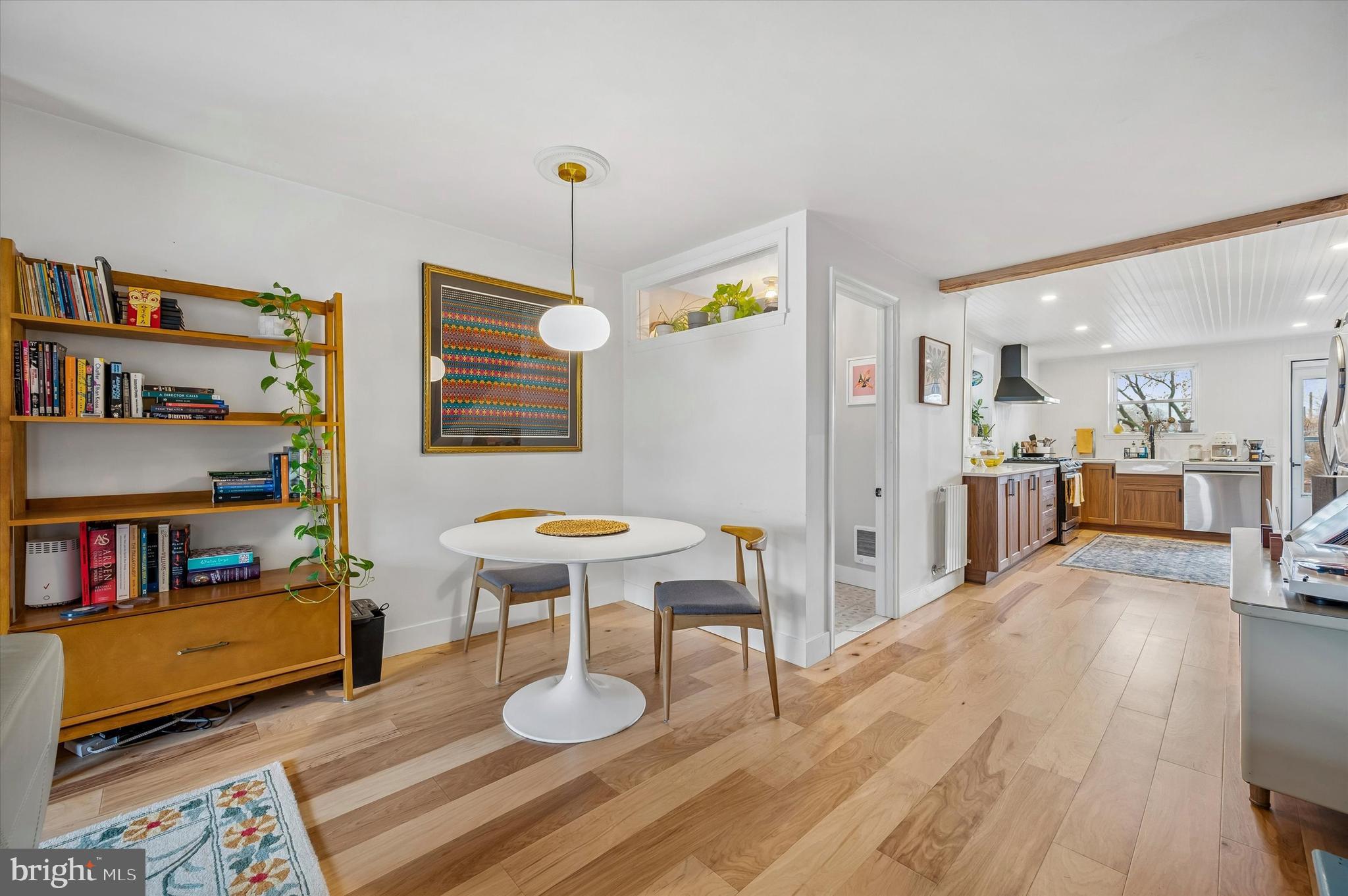 6626 Musgrave Street Philadelphia, PA 19119 - Photo 5 of 26 a view of kitchen island with furniture and wooden floor