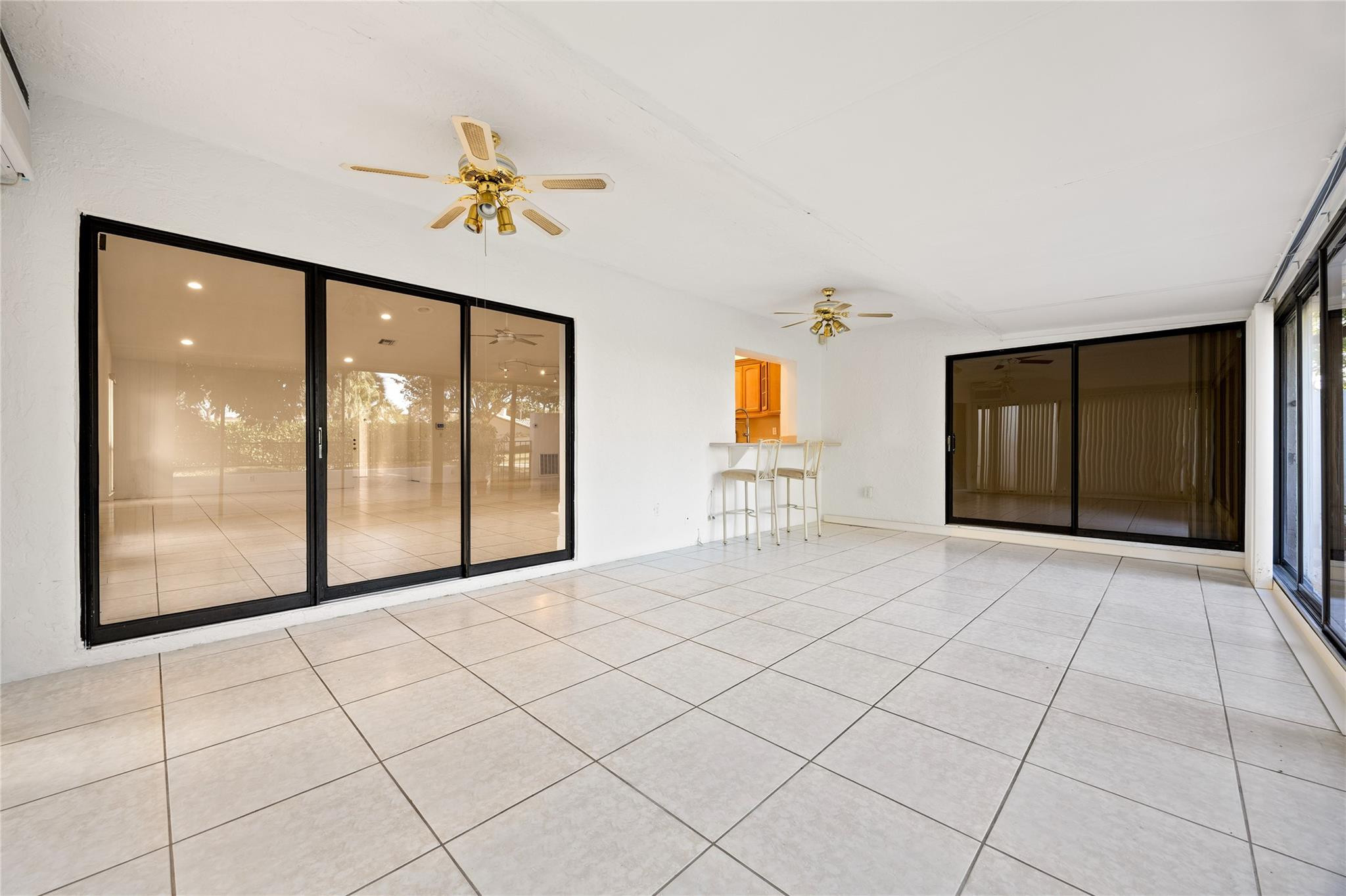 6825 Allegre Court Boca Raton, FL 33433 - Photo 11 of 31 a view of an empty room and window