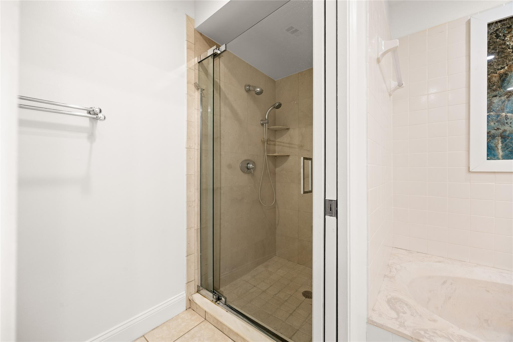 6825 Allegre Court Boca Raton, FL 33433 - Photo 18 of 31 a bathroom with a glass shower door