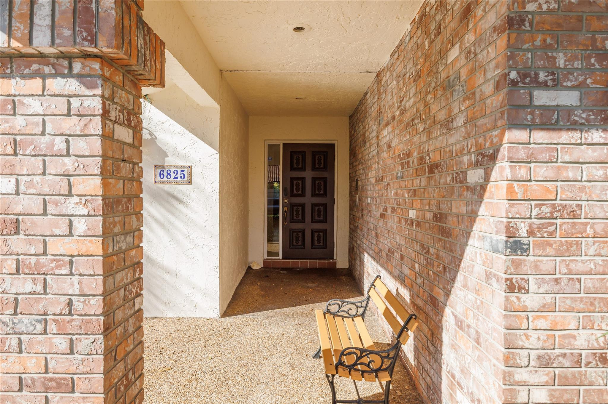 6825 Allegre Court Boca Raton, FL 33433 - Photo 2 of 31 a view of a brick buildings with entryway