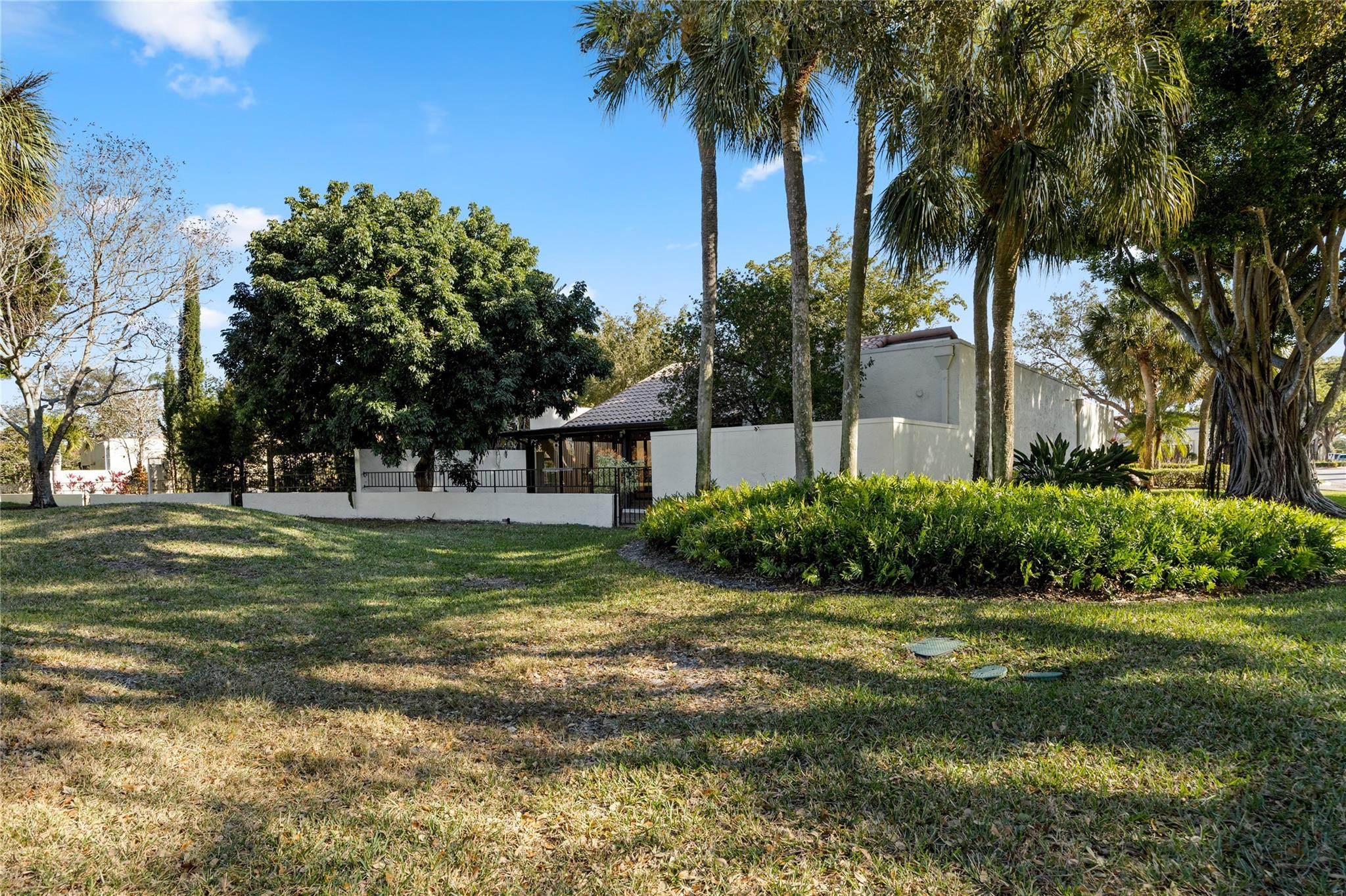 6825 Allegre Court Boca Raton, FL 33433 - Photo 29 of 31 a view of a house with a yard