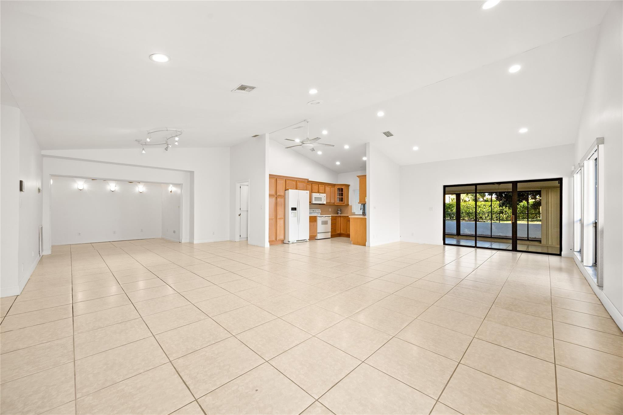 6825 Allegre Court Boca Raton, FL 33433 - Photo 3 of 31 a view of an empty room with glass door