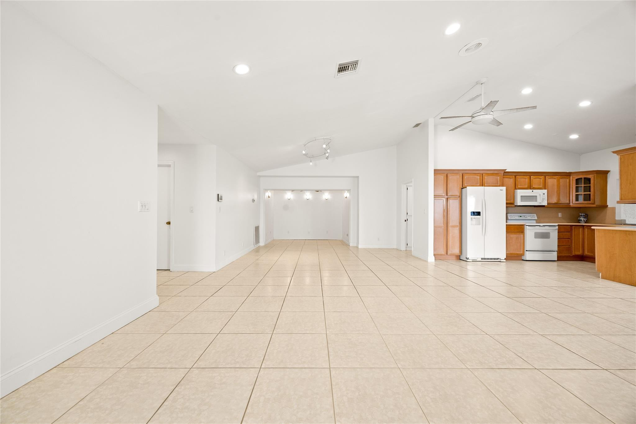 6825 Allegre Court Boca Raton, FL 33433 - Photo 9 of 31 a view of large kitchen with stainless steel appliances refrigerator and cabinets