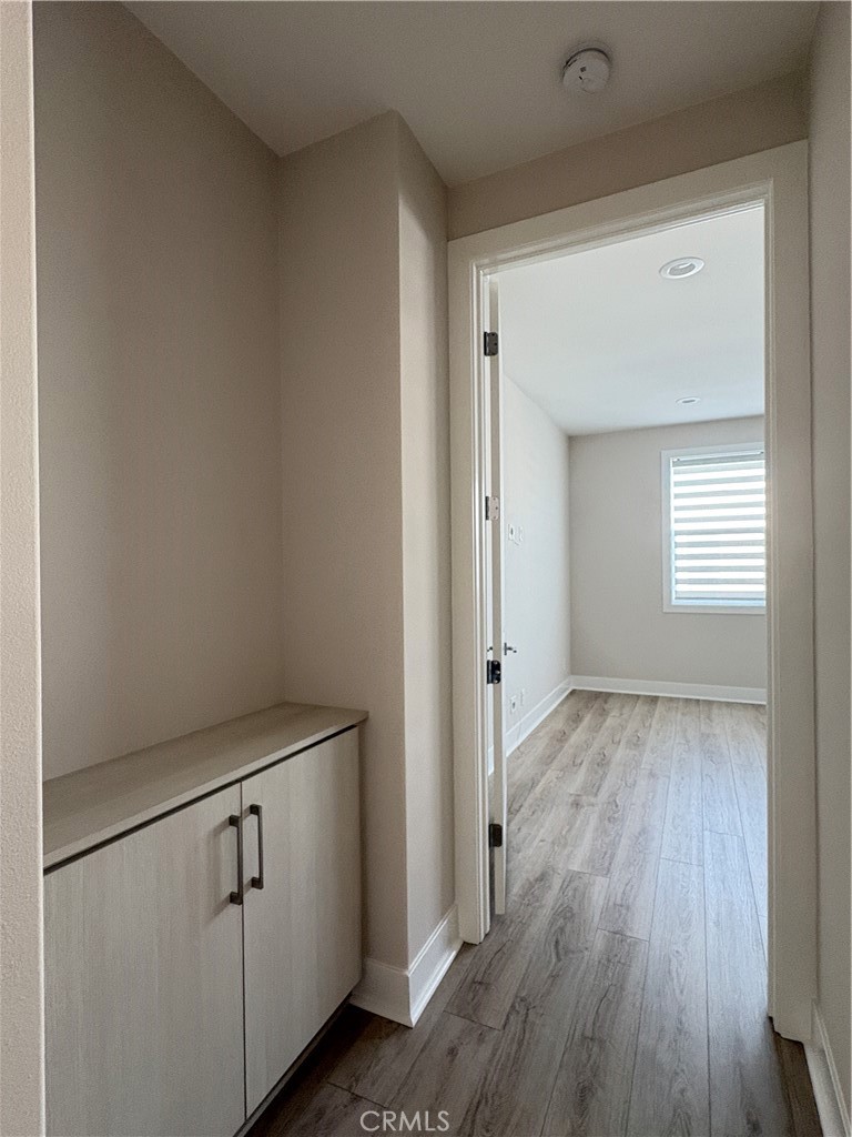160 Longden Lake Forest, CA 92630 - Photo 17 of 31 a view of an empty room with wooden floor and a window