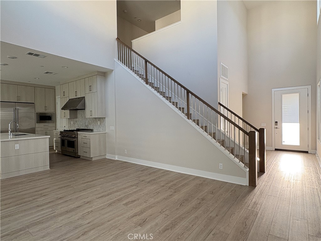160 Longden Lake Forest, CA 92630 - Photo 10 of 31 a view of kitchen with sink microwave and stove