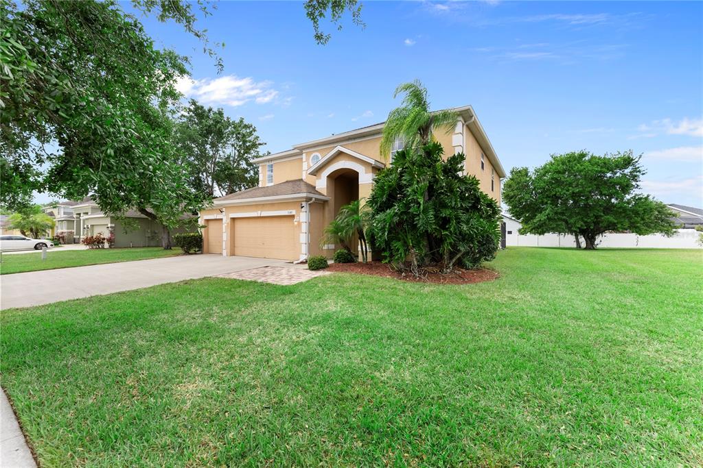 3149 Twisted Oak Loop Kissimmee, FL 34744 - Photo 3 of 52 a view of a house with a backyard