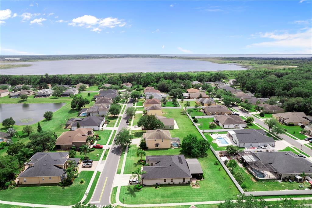 3149 Twisted Oak Loop Kissimmee, FL 34744 - Photo 51 of 52 an aerial view of house with yard swimming pool and outdoor seating