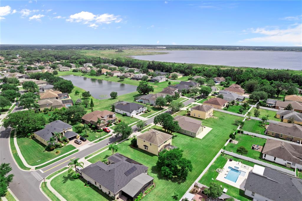 3149 Twisted Oak Loop Kissimmee, FL 34744 - Photo 52 of 52 an aerial view of a house with a garden