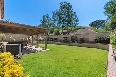 a view of a garden with patio