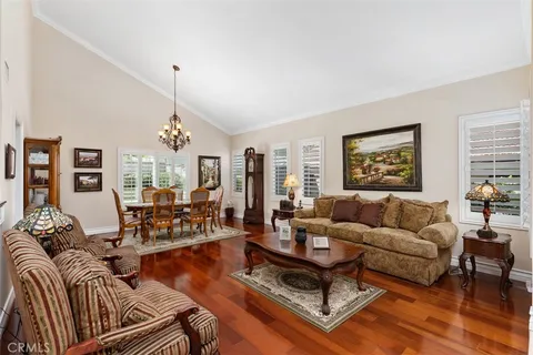 a living room with furniture or couch and a large window