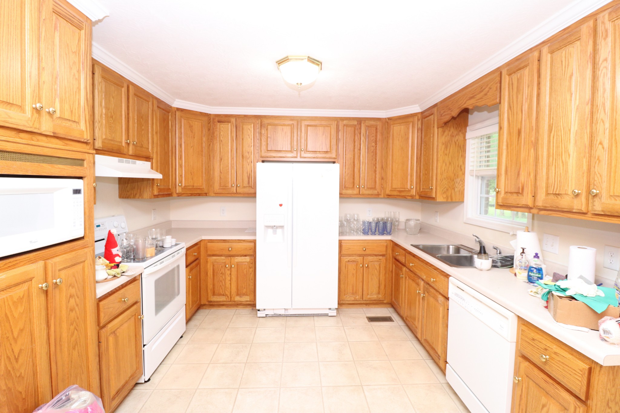 159 Abbey Road Gallatin, TN 37066 - Photo 8 of 30 a kitchen with stainless steel appliances a stove a sink and a refrigerator