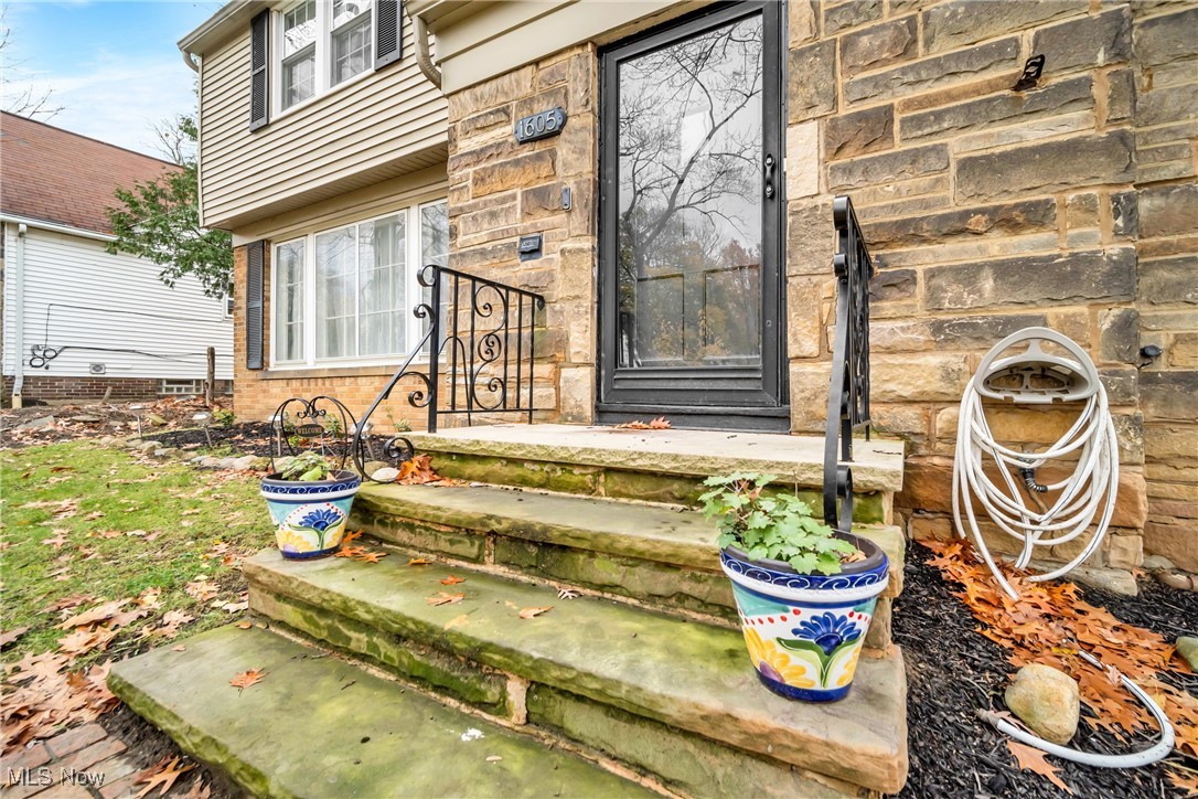 1605 Laclede Road Cleveland, OH 44121 - Photo 2 of 40 Entrance to property featuring stone siding