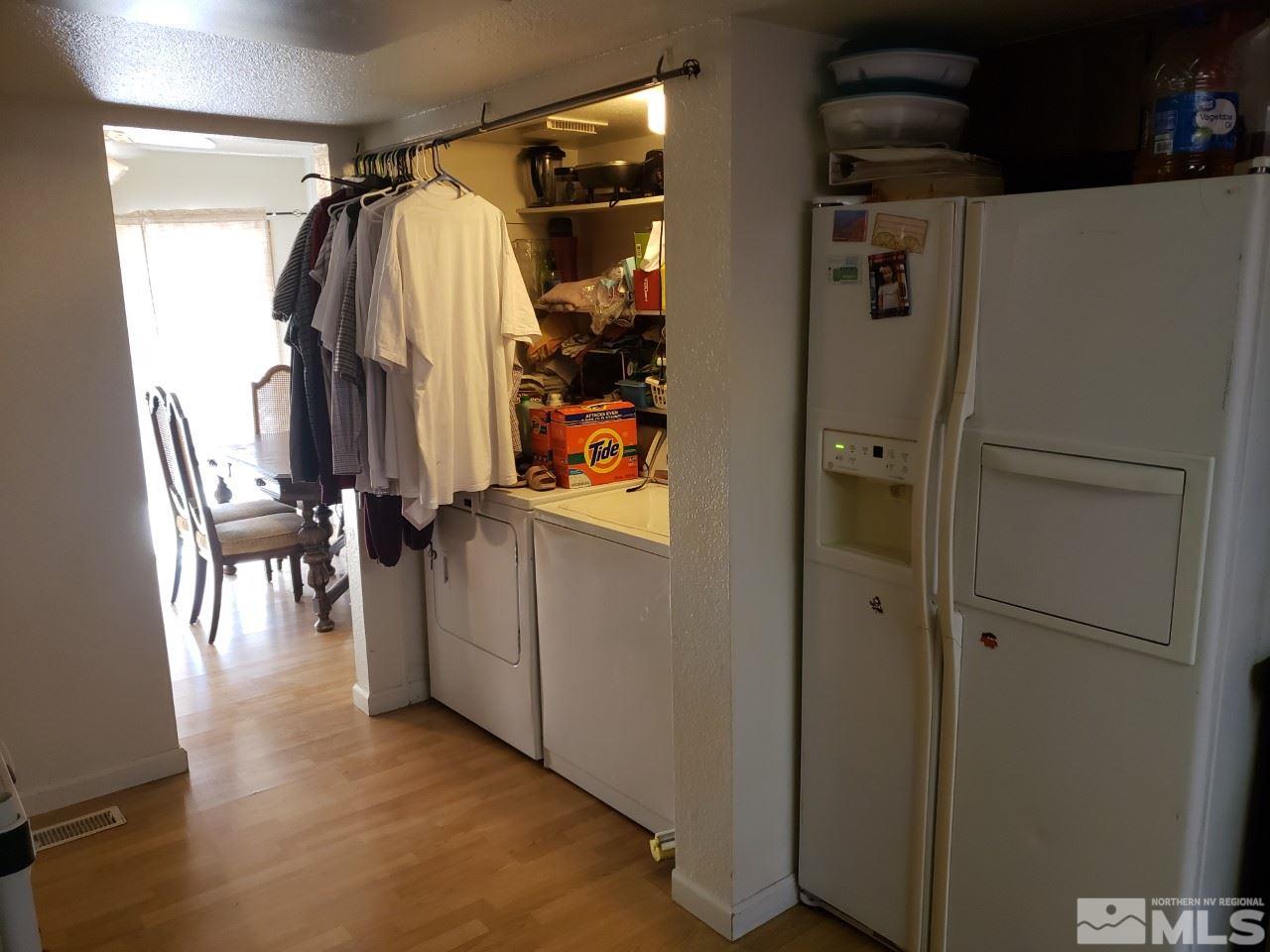 10044 Humite Lane Reno, NV 89506 - Photo 9 of 24 a view of walk in closet with clothes and shoes