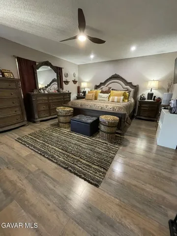 a kitchen with lots of counter top space sink and cabinets
