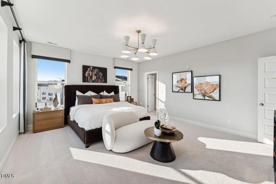 110 Byrum Street, Unit 302 Cary, NC 27511 - Photo 16 of 30 a bedroom with a bed and window