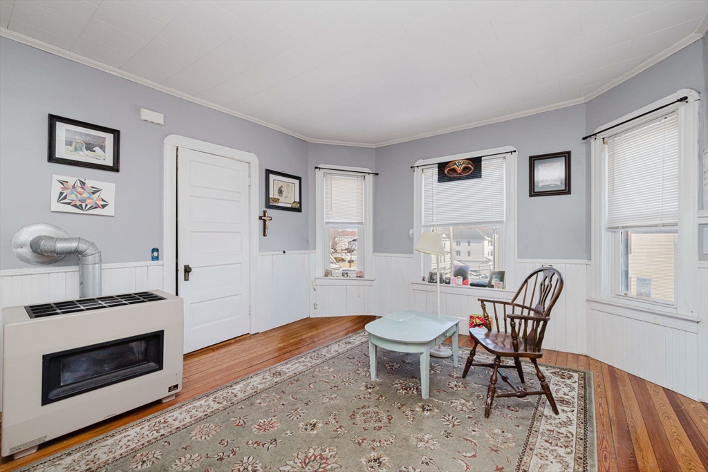 869 Bedford Street Fall River, MA 02723 - Photo 23 of 31 a view of a livingroom with furniture and a fireplace