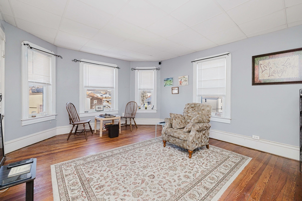 869 Bedford Street Fall River, MA 02723 - Photo 28 of 31 a living room with furniture rug and window