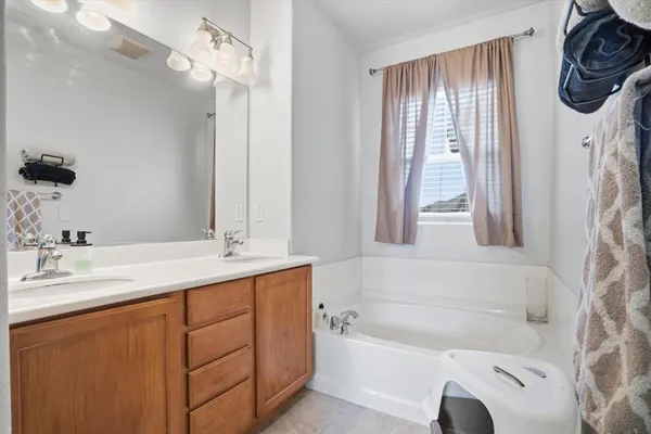 a bedroom with a bed and furniture