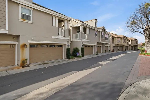 a front view of a building with a street