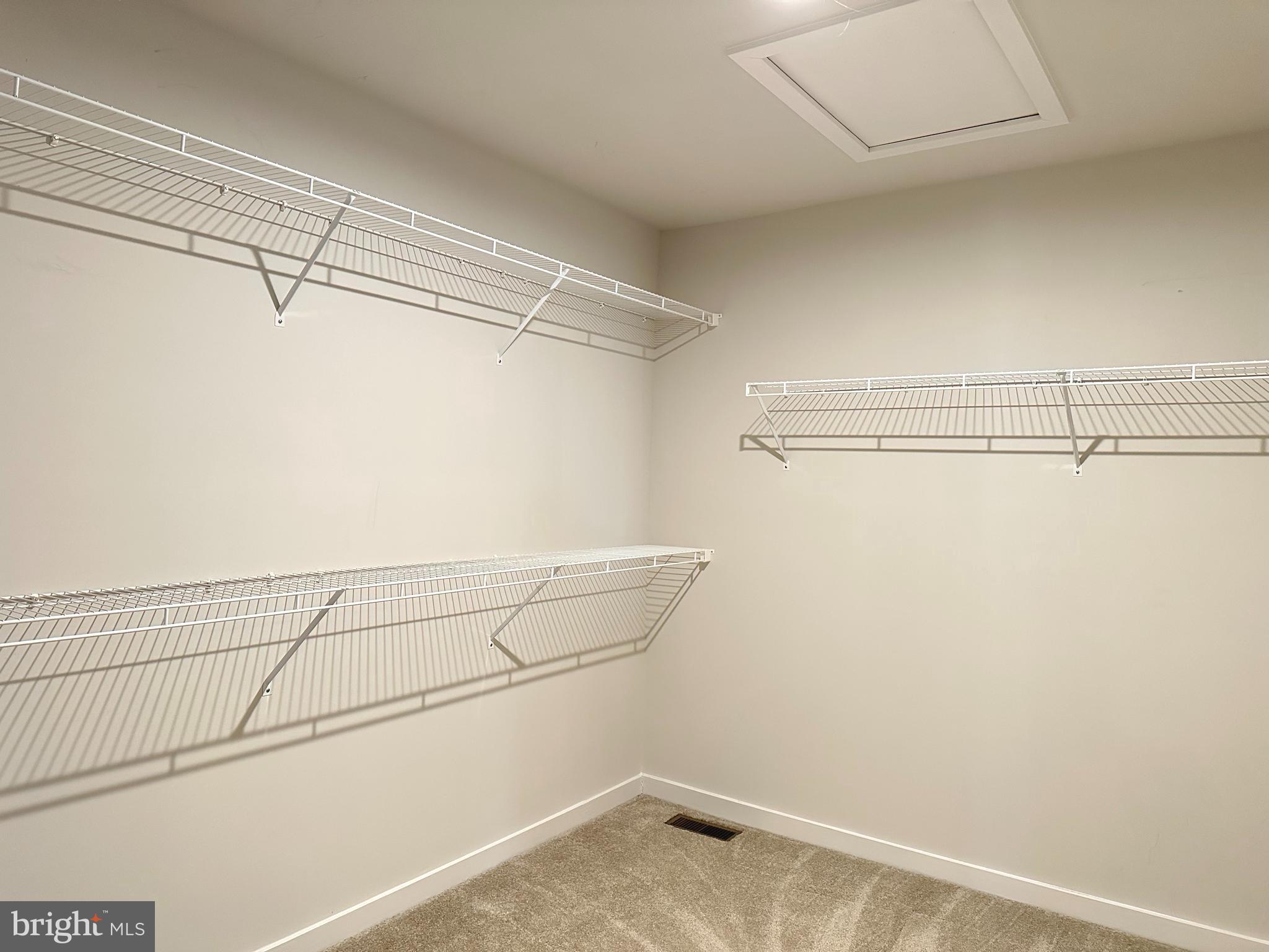 303 Wynstone Court Colmar, PA 18915 - Photo 16 of 26 a view of a room with racks on the wall