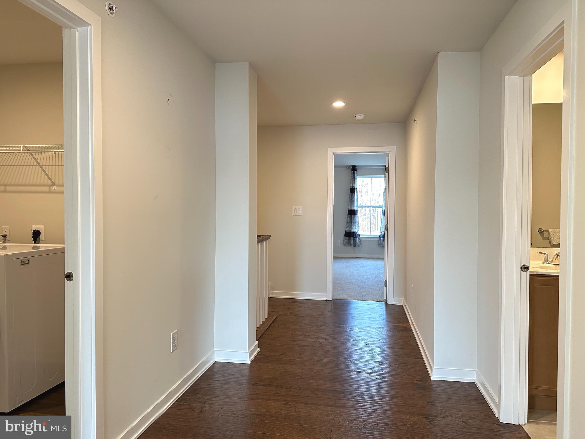 303 Wynstone Court Colmar, PA 18915 - Photo 10 of 26 a view of a hallway with wooden floor