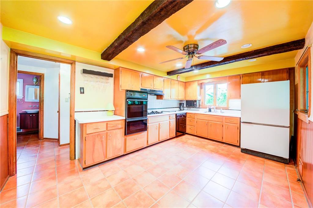 3927 Edge Road Pittsburgh, PA 15227 - Photo 9 of 25 Large eat in kitchen w/ beam ceilings