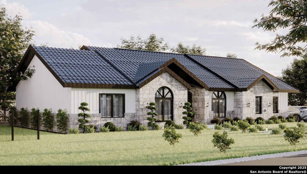 1637 Primrose Path Spring Branch, TX 78070 - Photo 2 of 6 a front view of a house with a yard