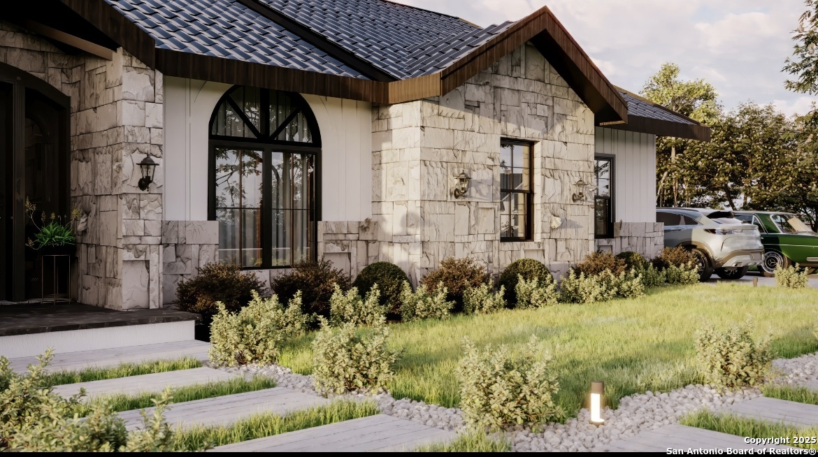 1637 Primrose Path Spring Branch, TX 78070 - Photo 4 of 6 a front view of a house with a yard