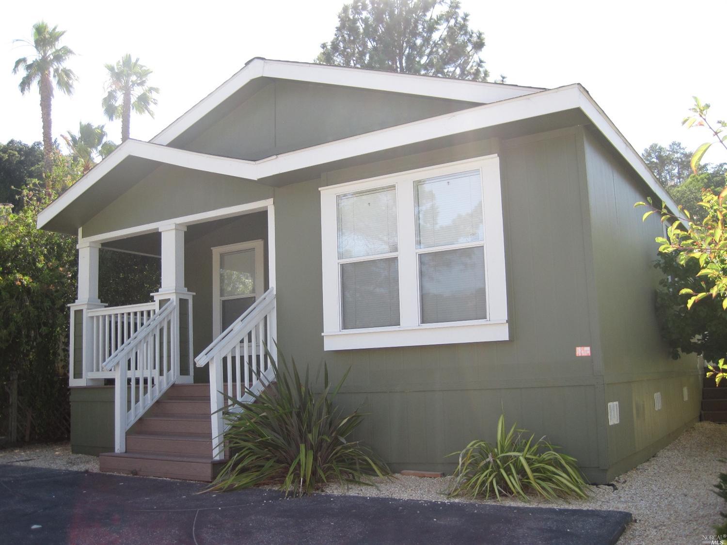 49 Yosemite Road, Unit 289 San Rafael, CA 94903 - Photo 1 of 1 a front view of a house with a yard