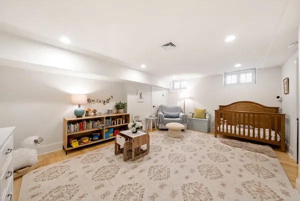 a bedroom with furniture and a bed