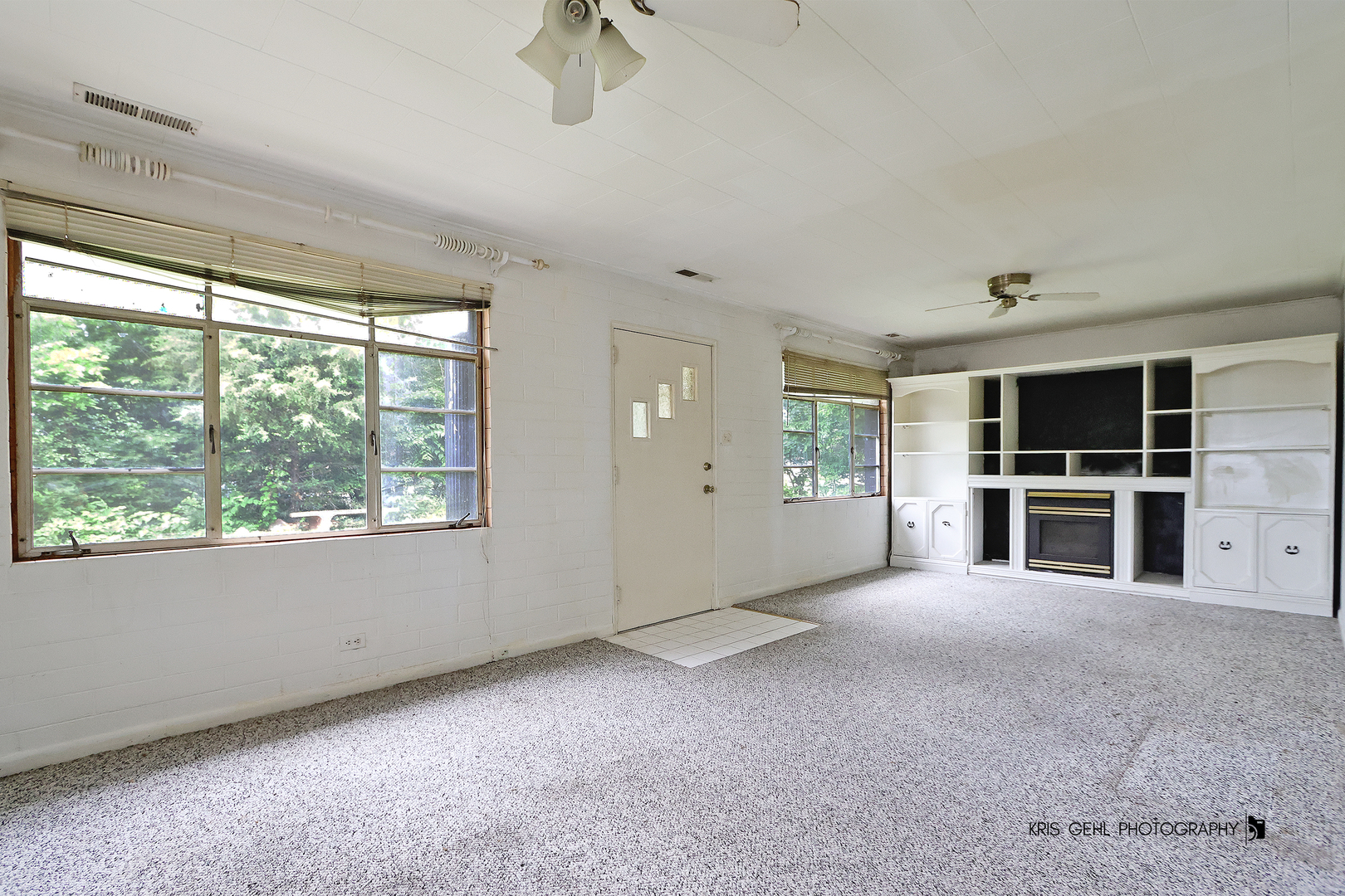 143 Eagle Point Road Fox Lake, IL 60020 - Photo 3 of 19 a view of a livingroom with an empty space and a window