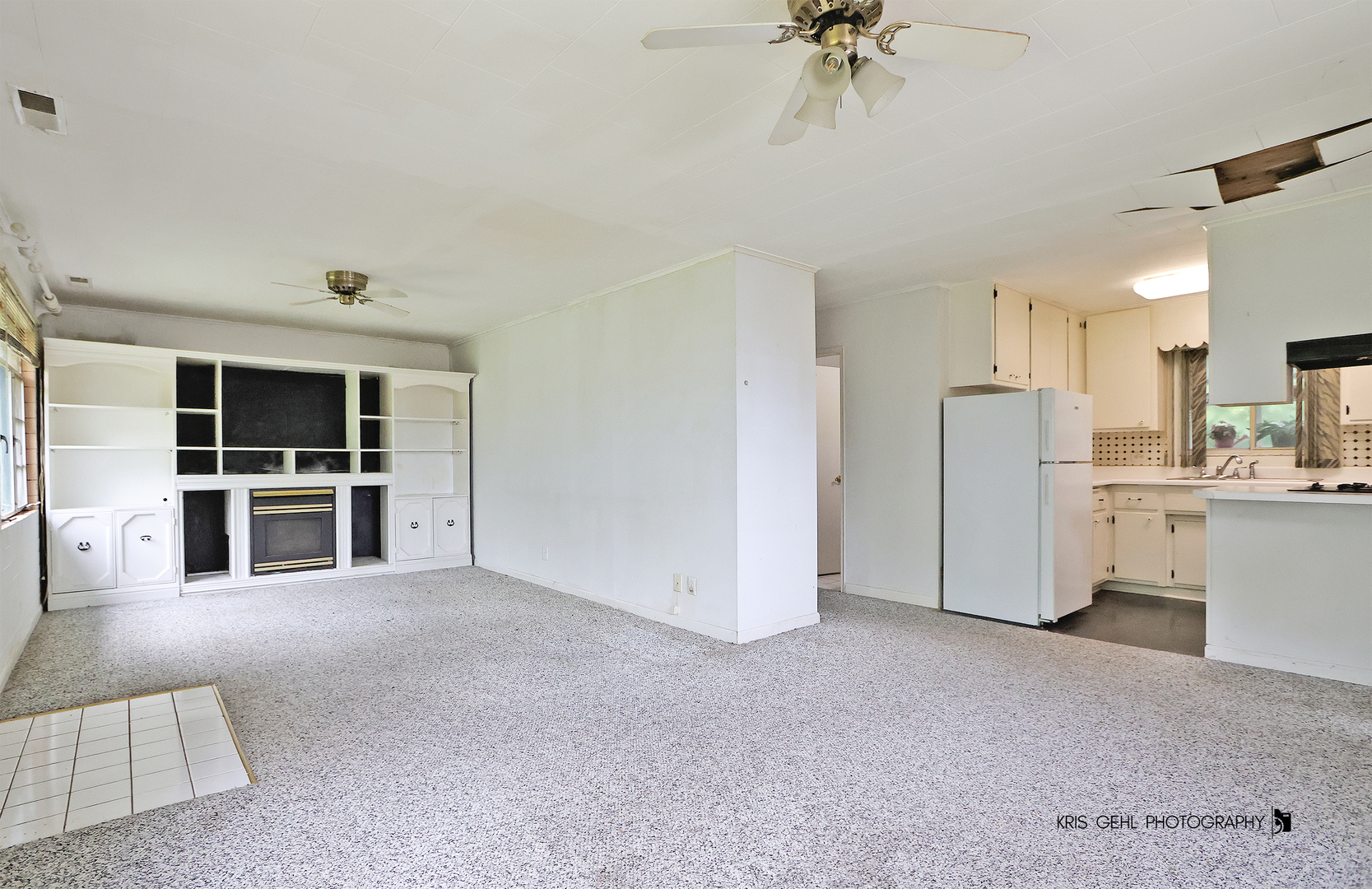 143 Eagle Point Road Fox Lake, IL 60020 - Photo 5 of 19 a view of a kitchen with refrigerator and a sink