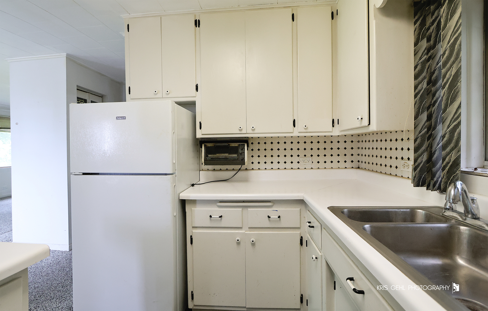 143 Eagle Point Road Fox Lake, IL 60020 - Photo 9 of 19 a white refrigerator freezer sitting inside of a kitchen