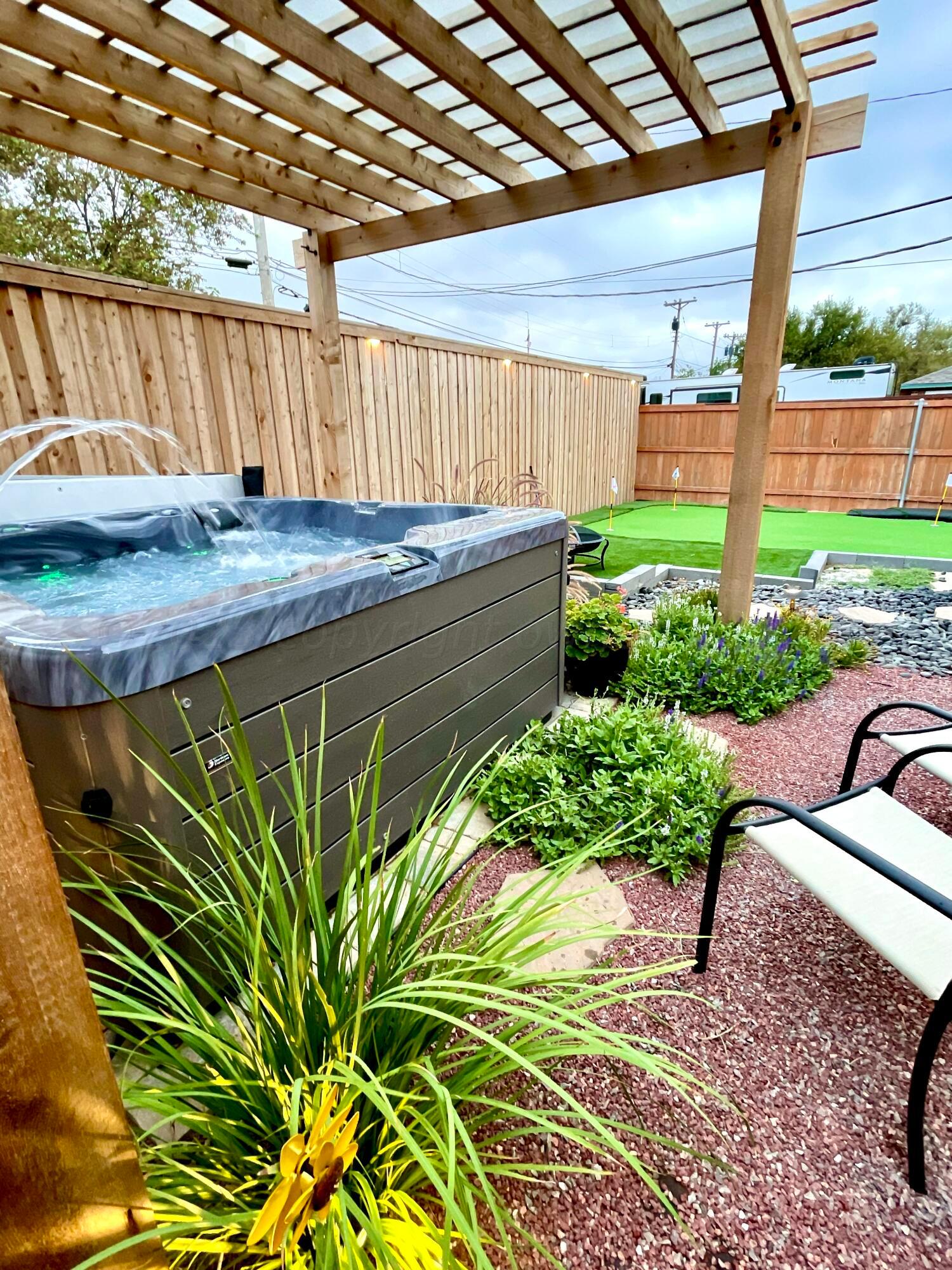 3501 Moss Lane Amarillo, TX 79109 - Photo 1 of 51 a view of a backyard with plants