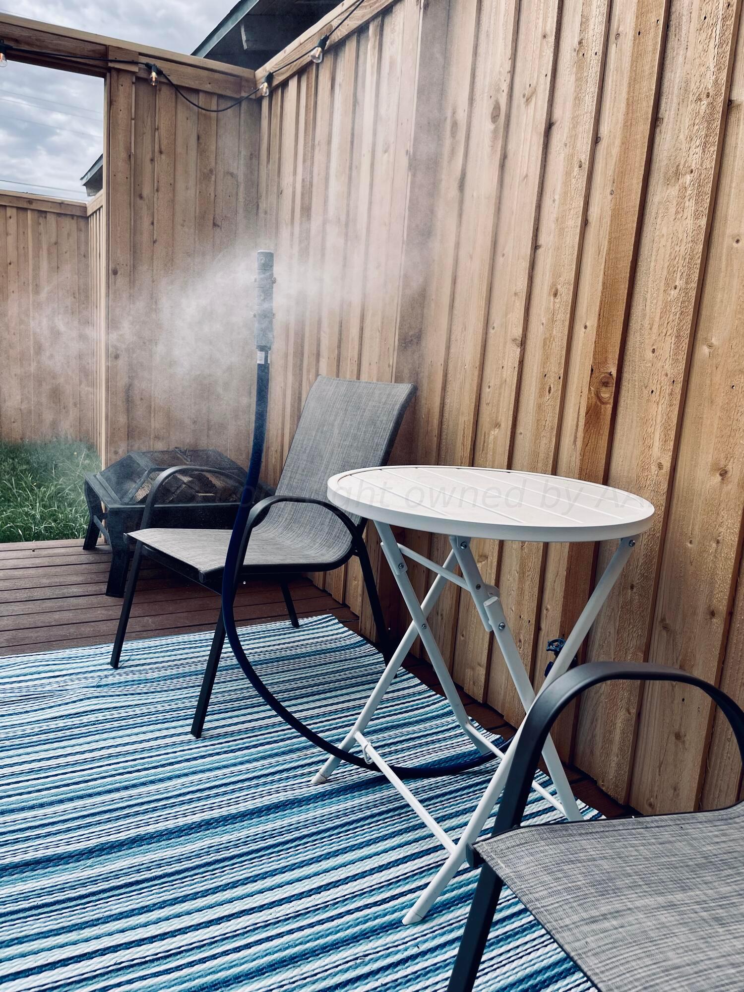 3501 Moss Lane Amarillo, TX 79109 - Photo 17 of 51 a view of a balcony with chairs and wooden floor