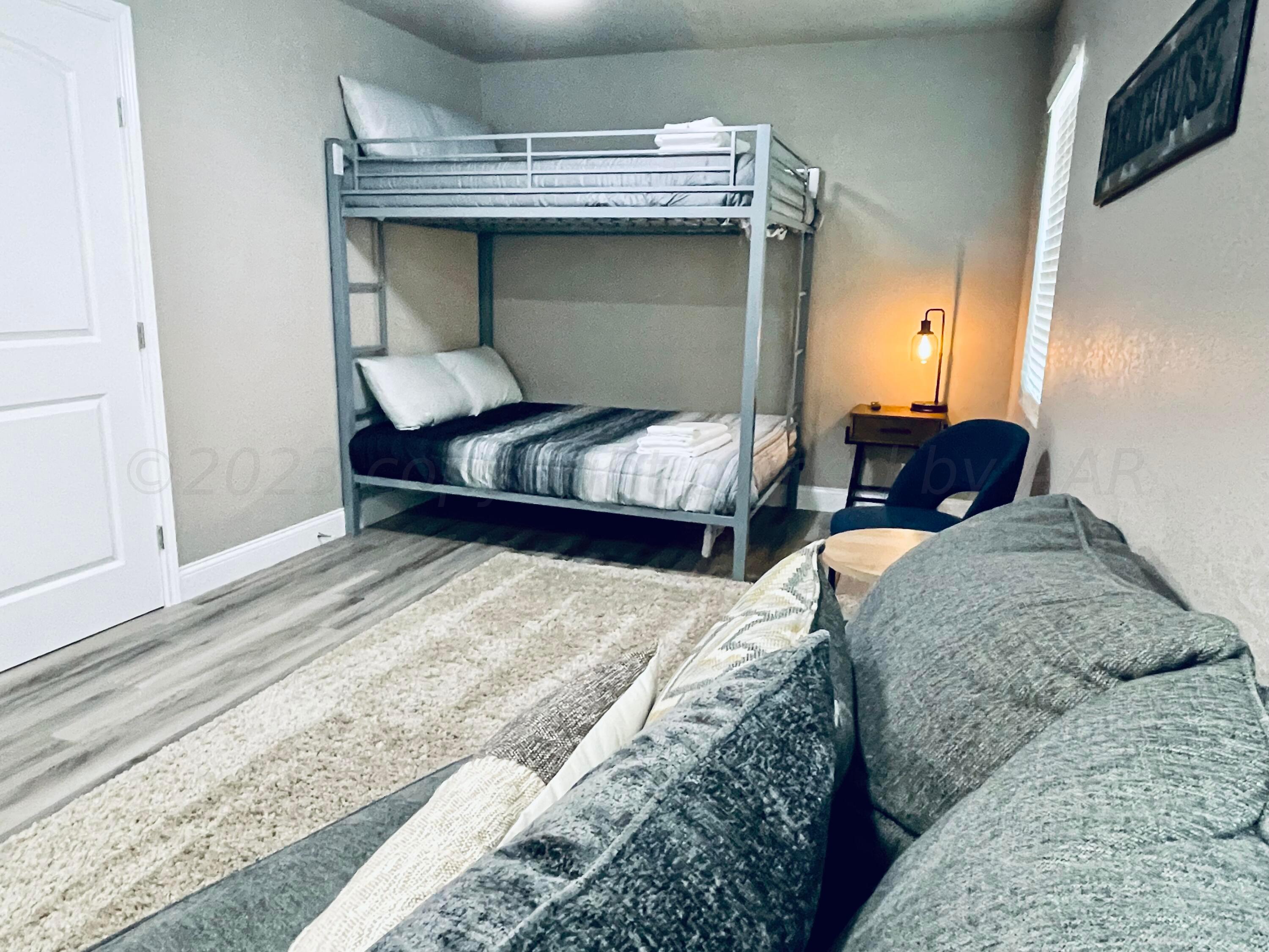 3501 Moss Lane Amarillo, TX 79109 - Photo 28 of 51 a bedroom with a bed and a dresser