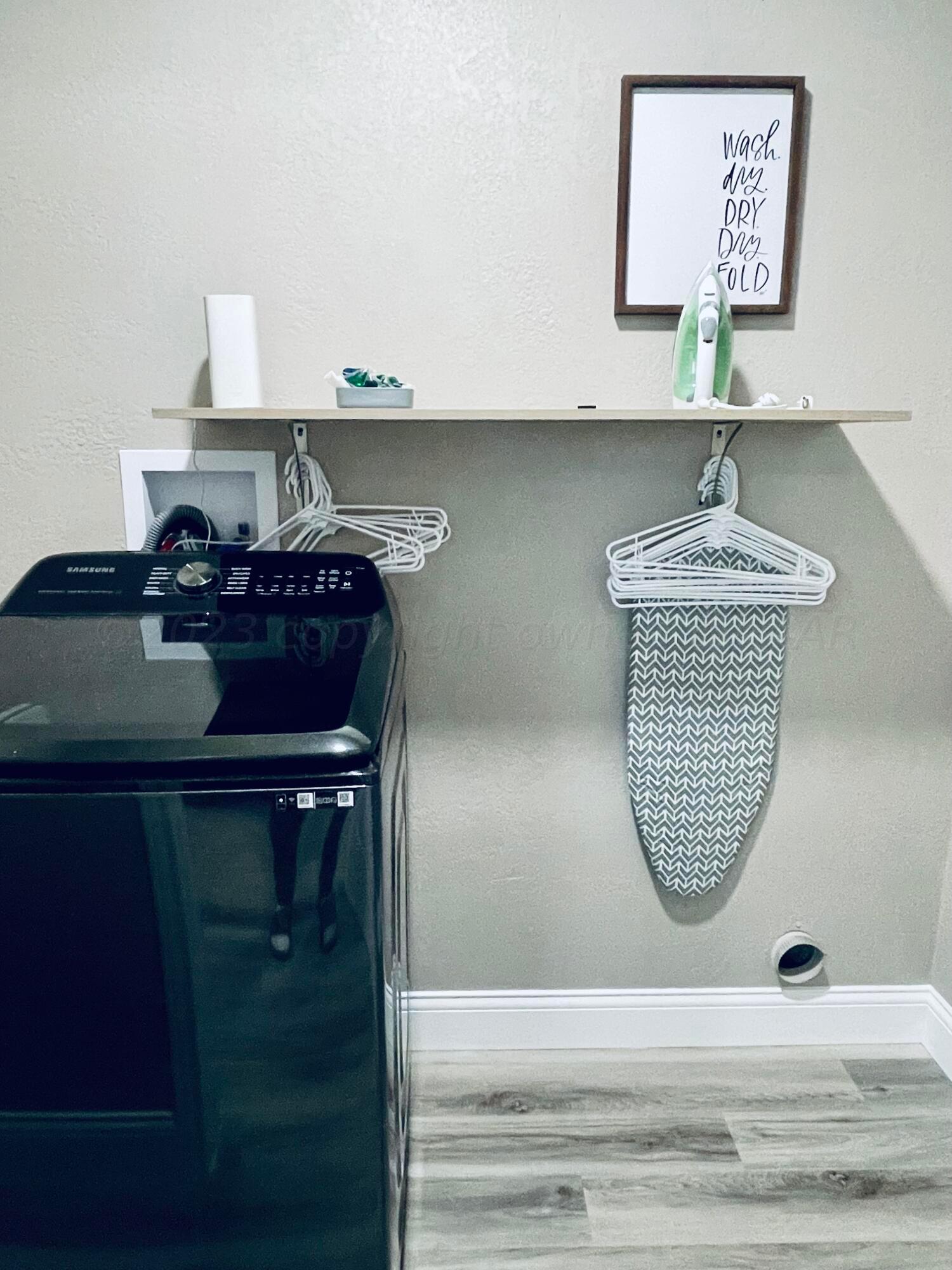 3501 Moss Lane Amarillo, TX 79109 - Photo 29 of 51 a bathroom with a sink and a mirror