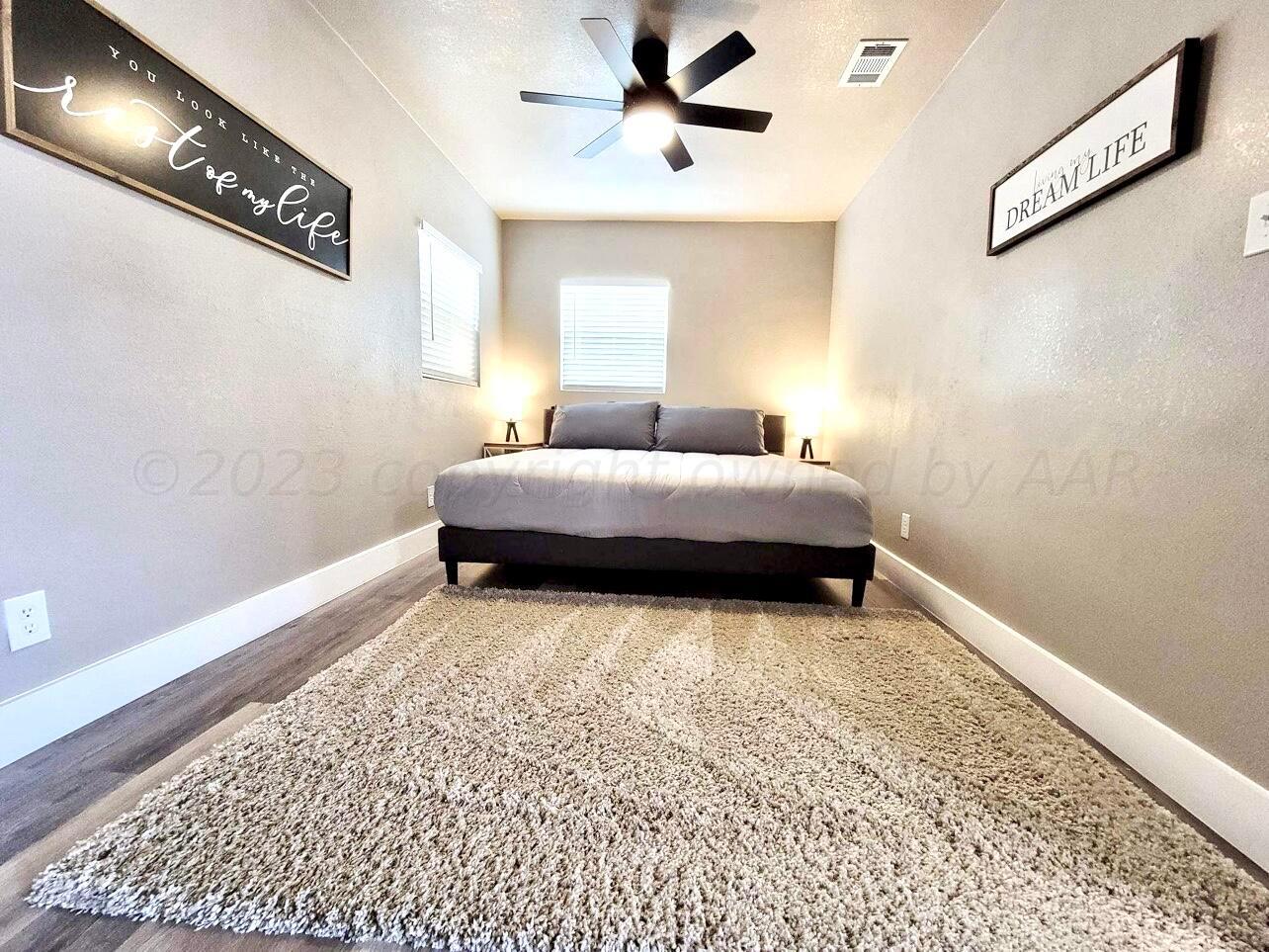 3501 Moss Lane Amarillo, TX 79109 - Photo 40 of 51 a room with a bed and a window